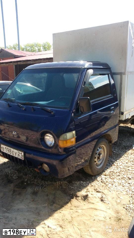 Фото автомобиля HYUNDAI PORTER, 2006 — госномер Р077НЕ32. Цвет: синий