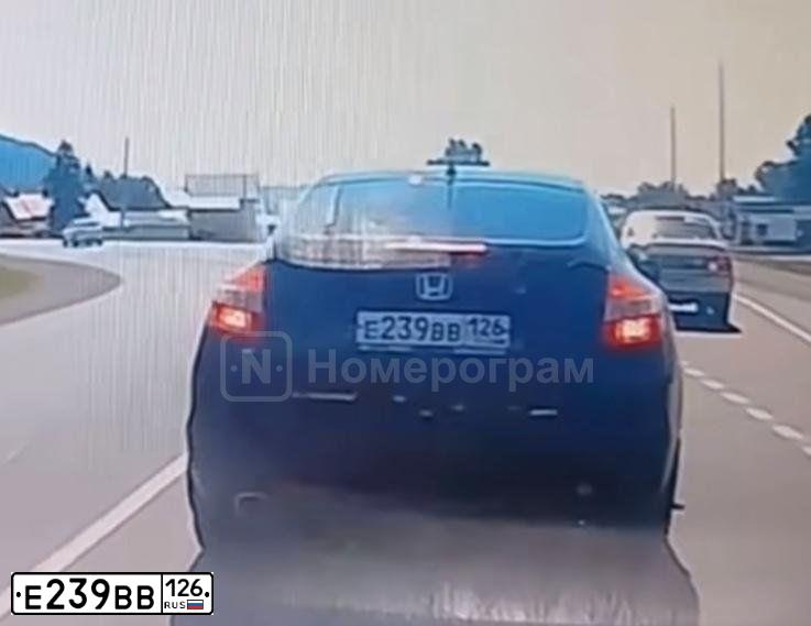 Фото автомобиля HONDA CROSSROAD, 2011 — госномер Е239ВВ126. Цвет: ЧЕРНЫЙ
