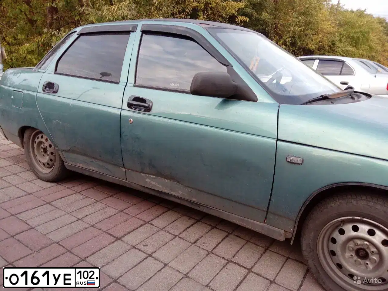 Фото автомобиля LADA 2110, 1999 — госномер М084ЕМ102. Цвет: СЕРЕБР-ЖЕЛТО-ЗЕЛЕНЫЙ