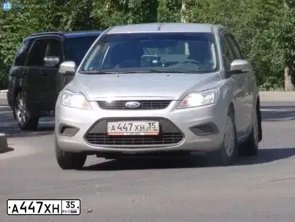 Фото автомобиля FORD FOCUS, 2010 — госномер В108ТР35. Цвет: Серебристый