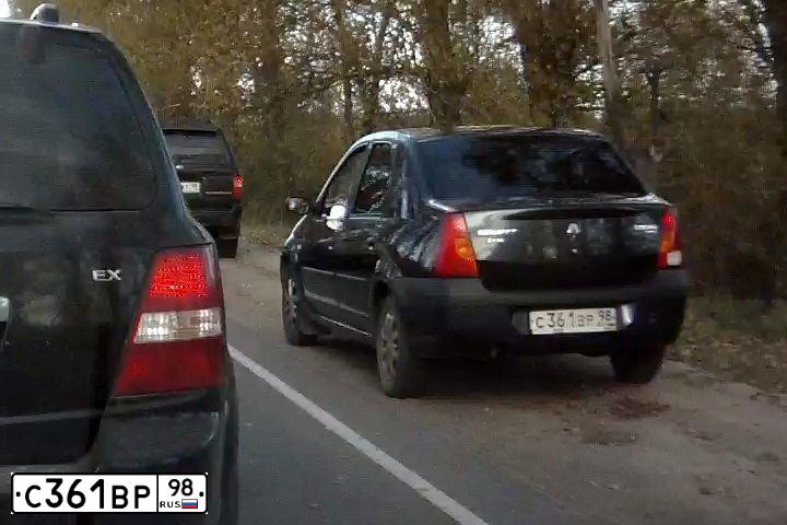 Фото автомобиля RENAULT LOGAN, 2007 — госномер Н261НМ10. Цвет: ТЕМНО-СЕРЫЙ