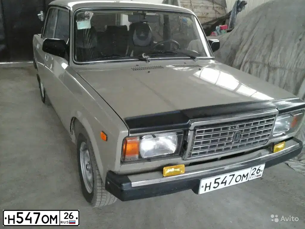 Фото автомобиля LADA 2107 LADA, 2003 — госномер Е768РА126. Цвет: БЕЖЕВО-ЗЕЛЕНЫЙ