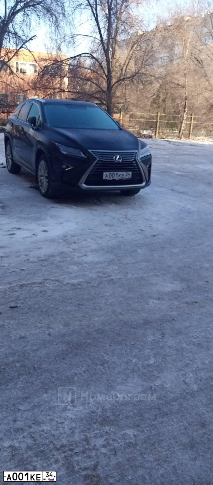 Фото автомобиля LEXUS LX, 2008 — госномер А001КЕ34. Цвет: ЧЕРНЫЙ