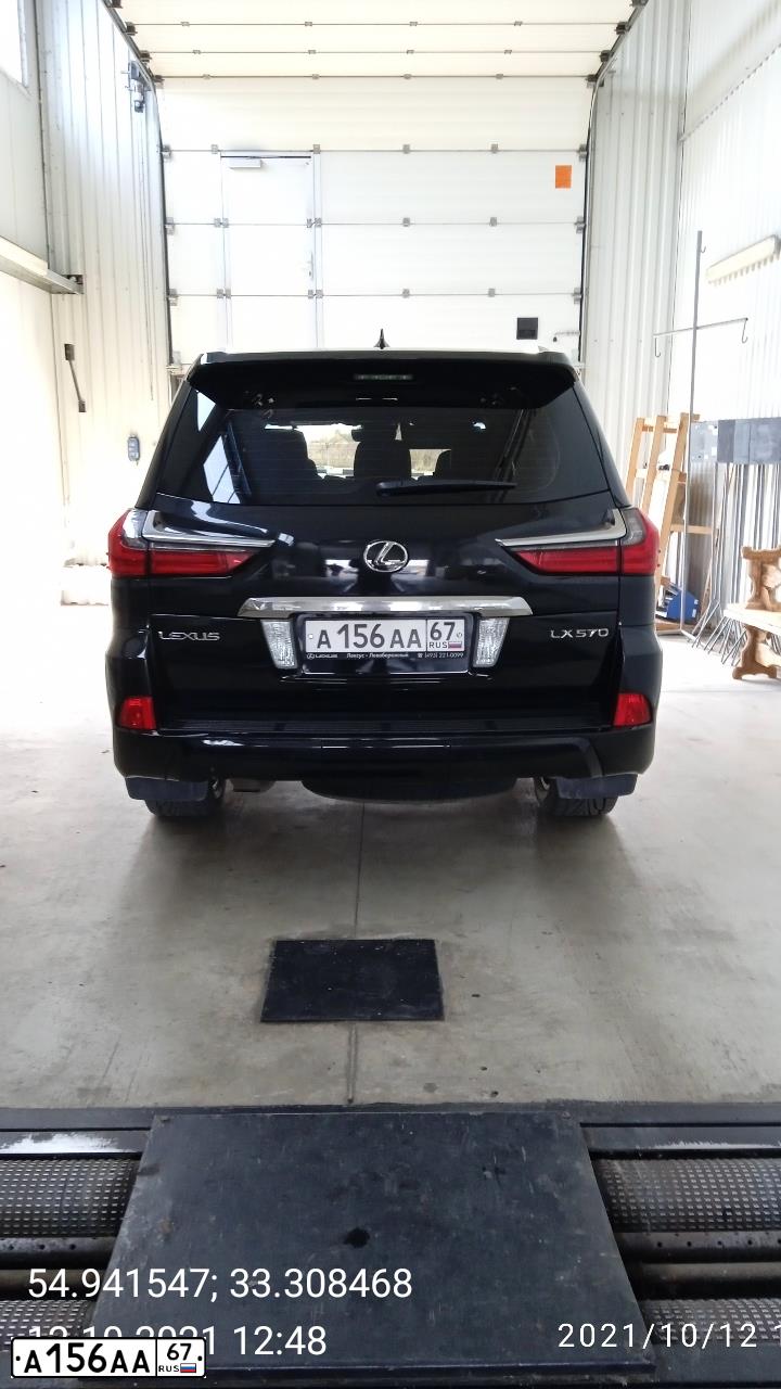 Фото автомобиля NISSAN PATROL, 2010 — госномер К564УМ799. Цвет: ЧЕРНЫЙ