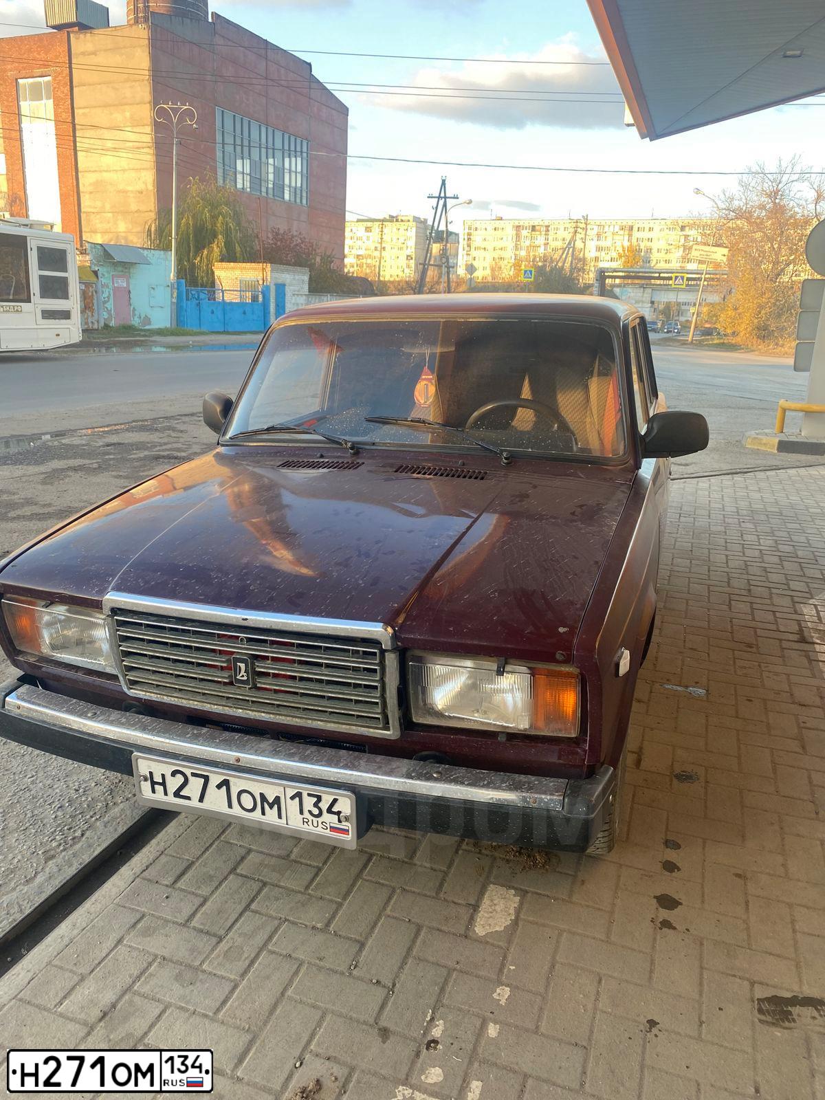 Фото автомобиля LADA 2107 LADA, 2008 — госномер Н271ОМ134. Цвет: ТЕМНО ВИШНЕВЫЙ