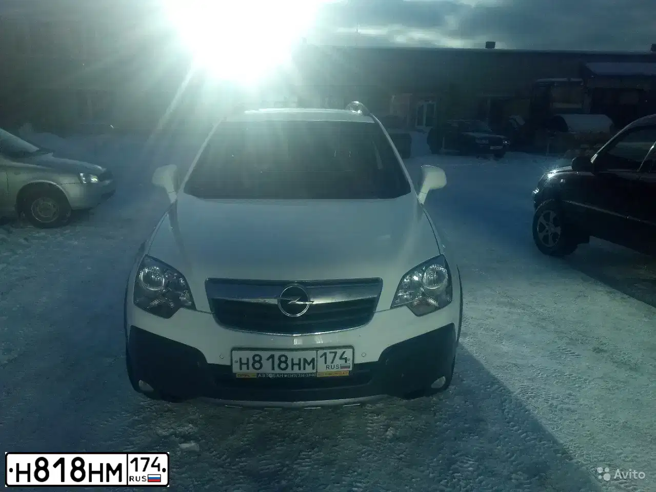 Фото автомобиля OPEL ANTARA, 2011 — госномер Н818НМ174. Цвет: Белый
