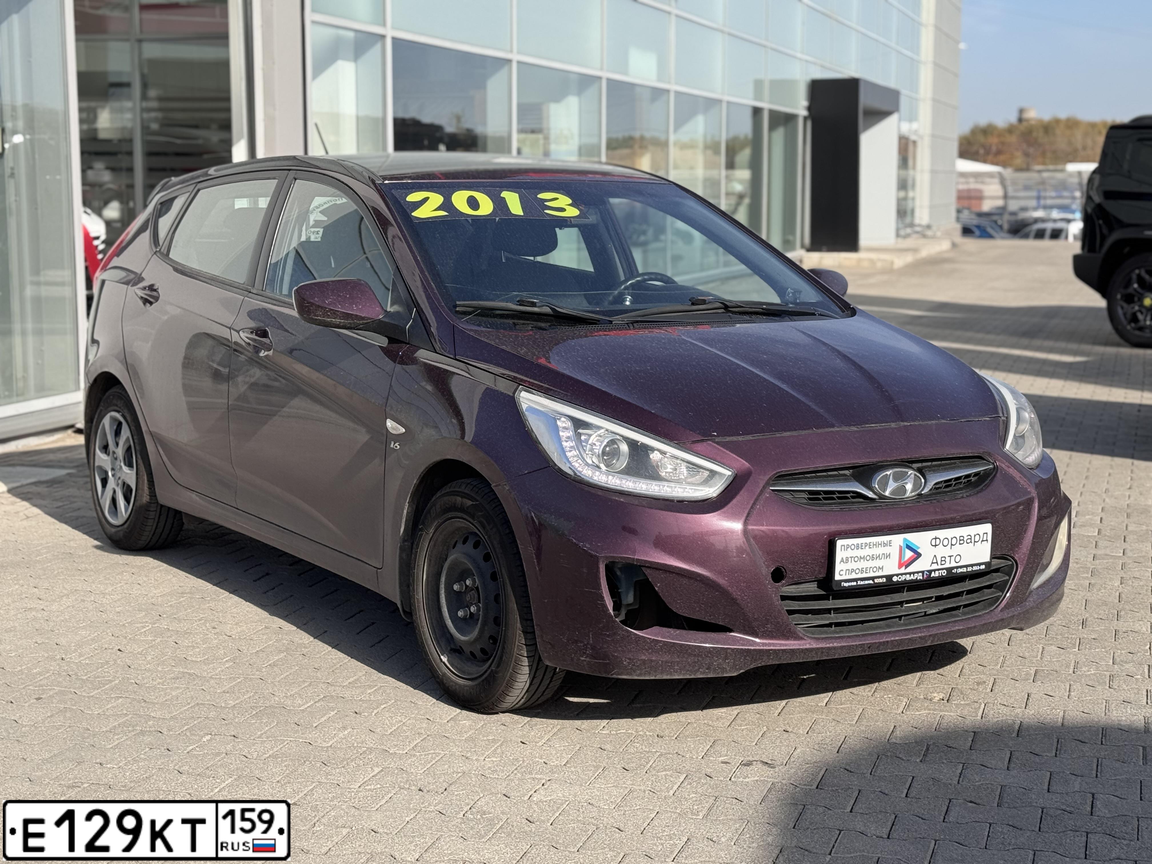 Фото автомобиля HYUNDAI SOLARIS, 2013 — госномер Е129КТ159. Цвет: ФИОЛЕТОВЫЙ
