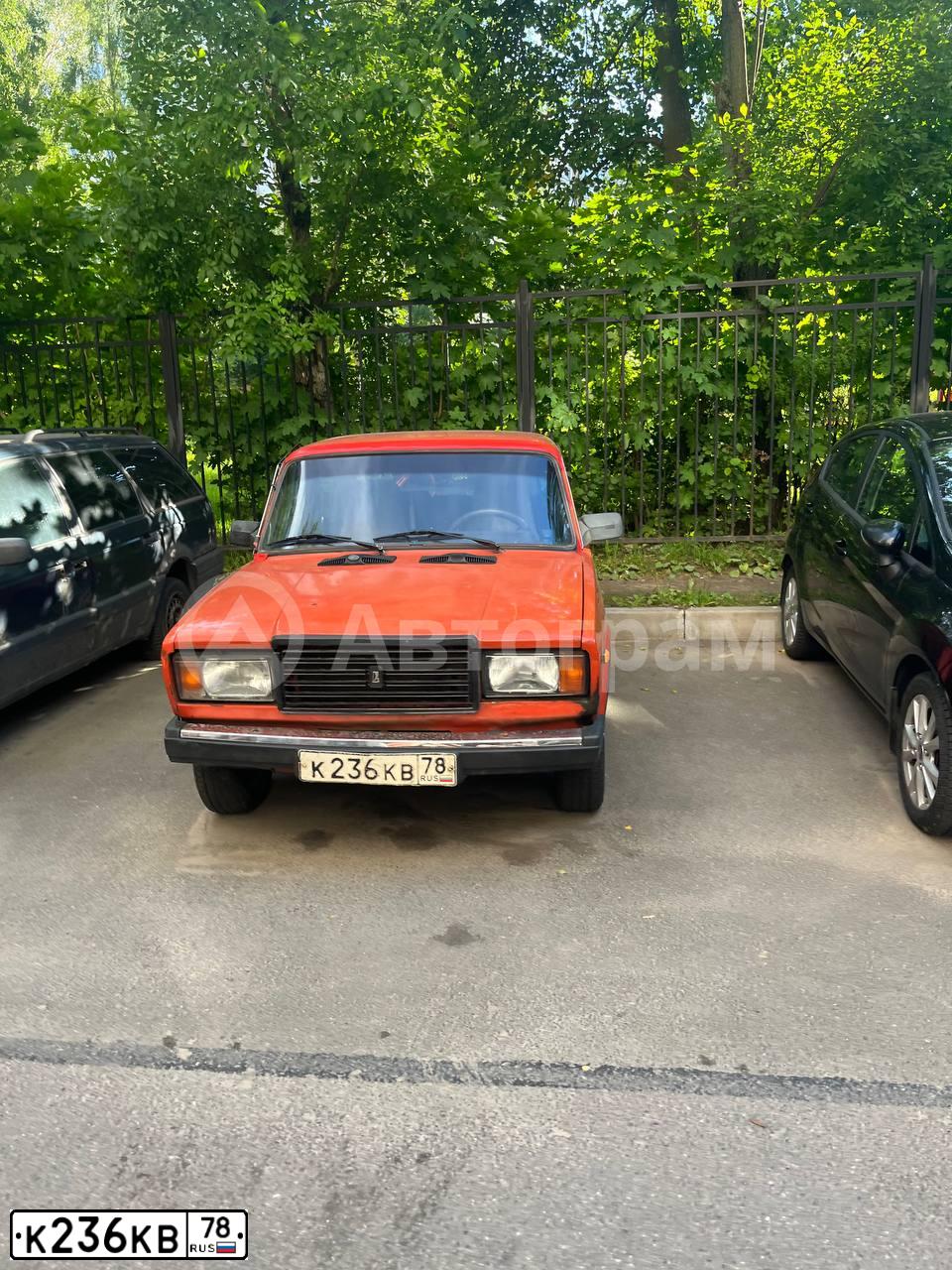 Фото автомобиля LADA 2107, 1984 — госномер К236КВ78. Цвет: ОРАНЖЕВЫЙ