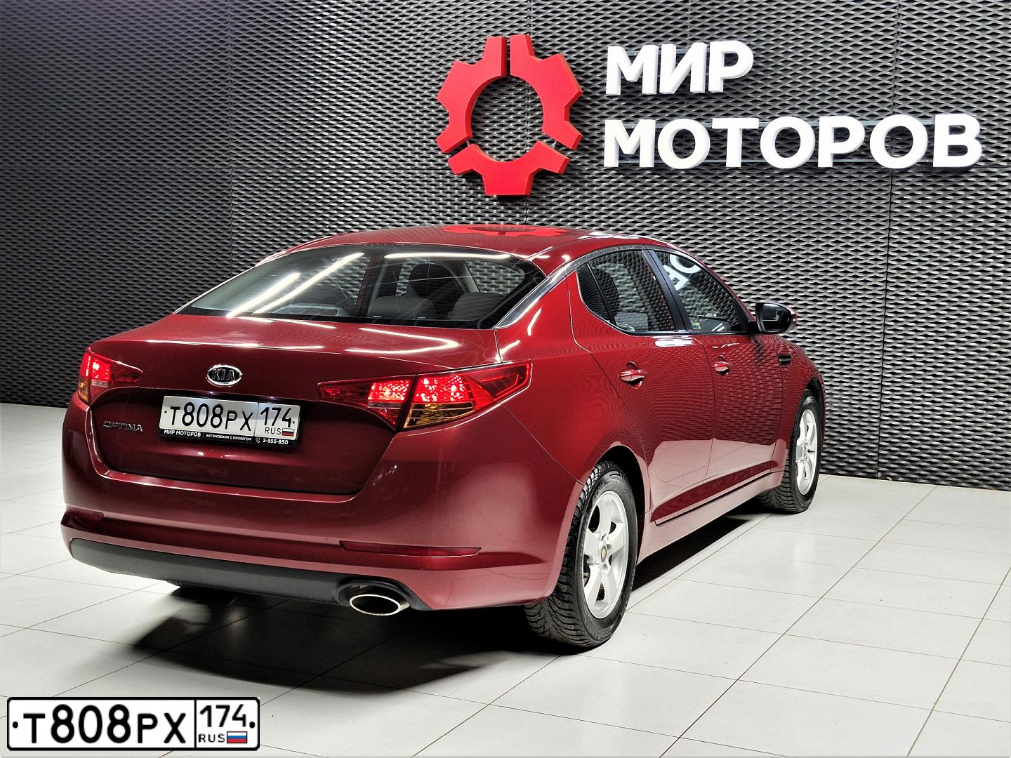 Фото автомобиля KIA MAGENTIS / OPTIMA, 2011 — госномер Т808РХ174. Цвет: Красный