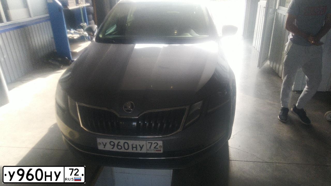 Фото автомобиля SKODA OCTAVIA, 2017 — госномер Т484ХВ72. Цвет: ТЕМНО СЕРЫЙ