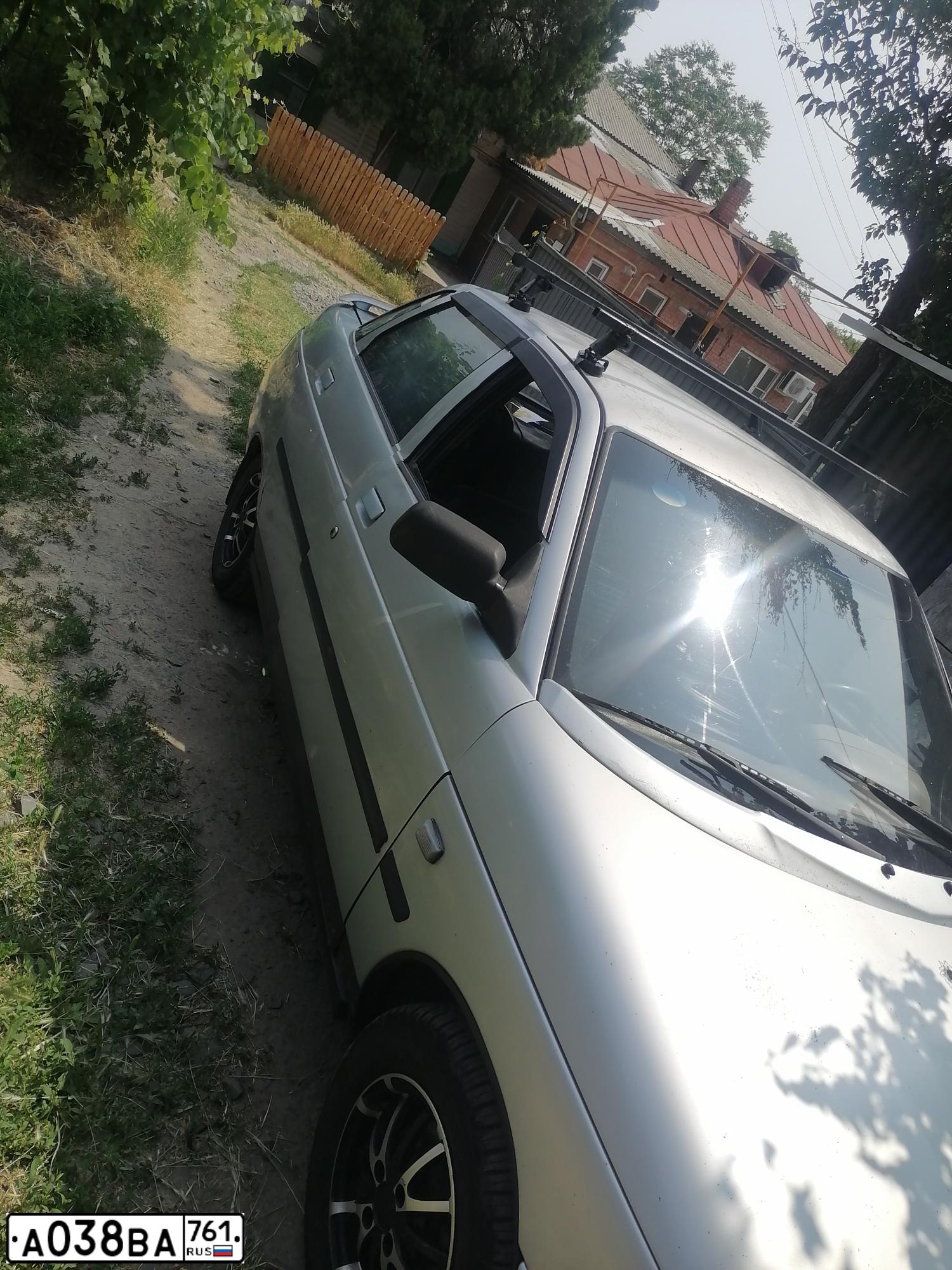 Фото автомобиля LADA 2110 LADA, 2001 — госномер А038ВА761. Цвет: СЕРЕБРИСТО-ГОЛУБОЙ