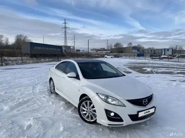 Фото автомобиля MAZDA 6, 2009 — госномер Е903КВ977. Цвет: Белый