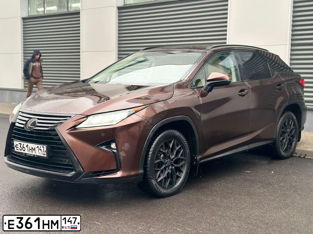 Фото автомобиля LEXUS RX, 2016 — госномер О400СА198. Цвет: Коричневый