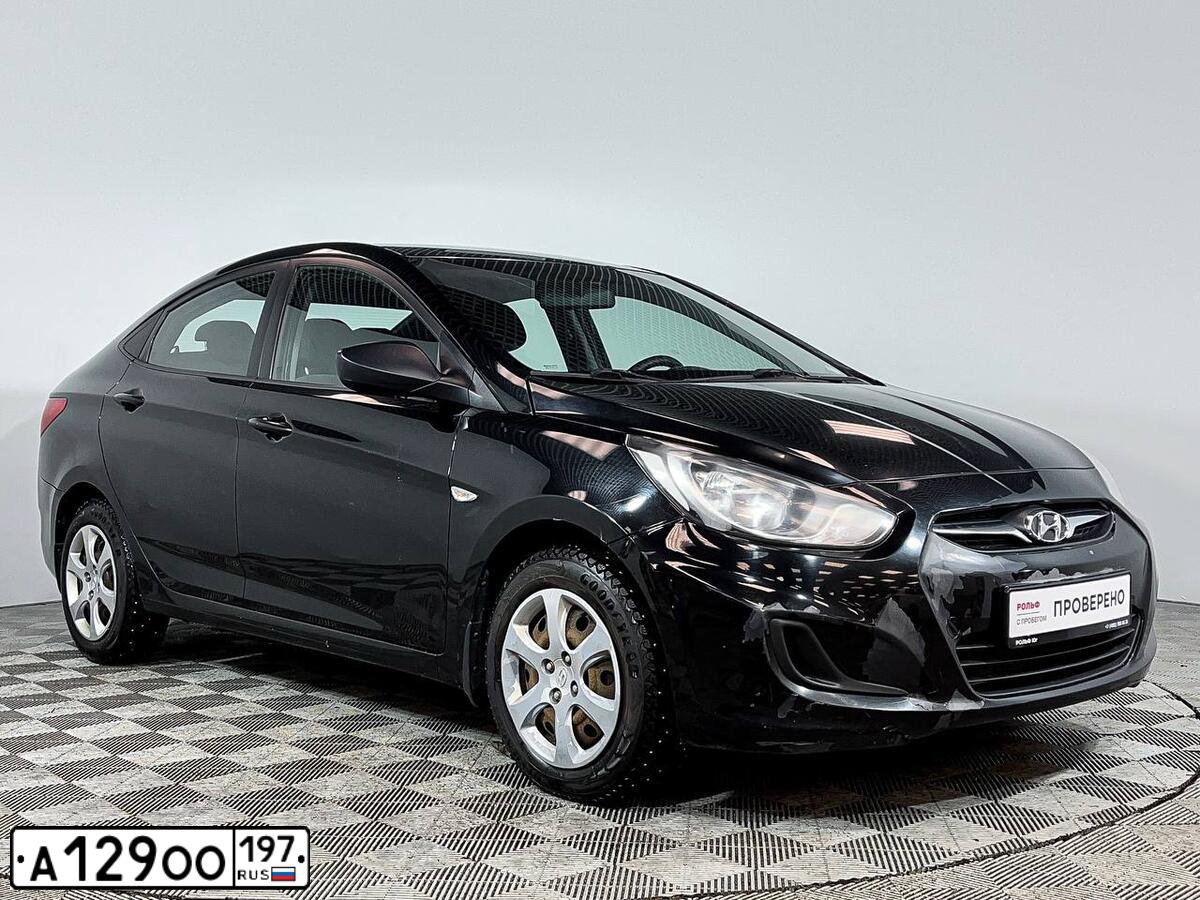 Фото автомобиля HYUNDAI SOLARIS, 2011 — госномер К013РТ799. Цвет: ЧЕРНЫЙ