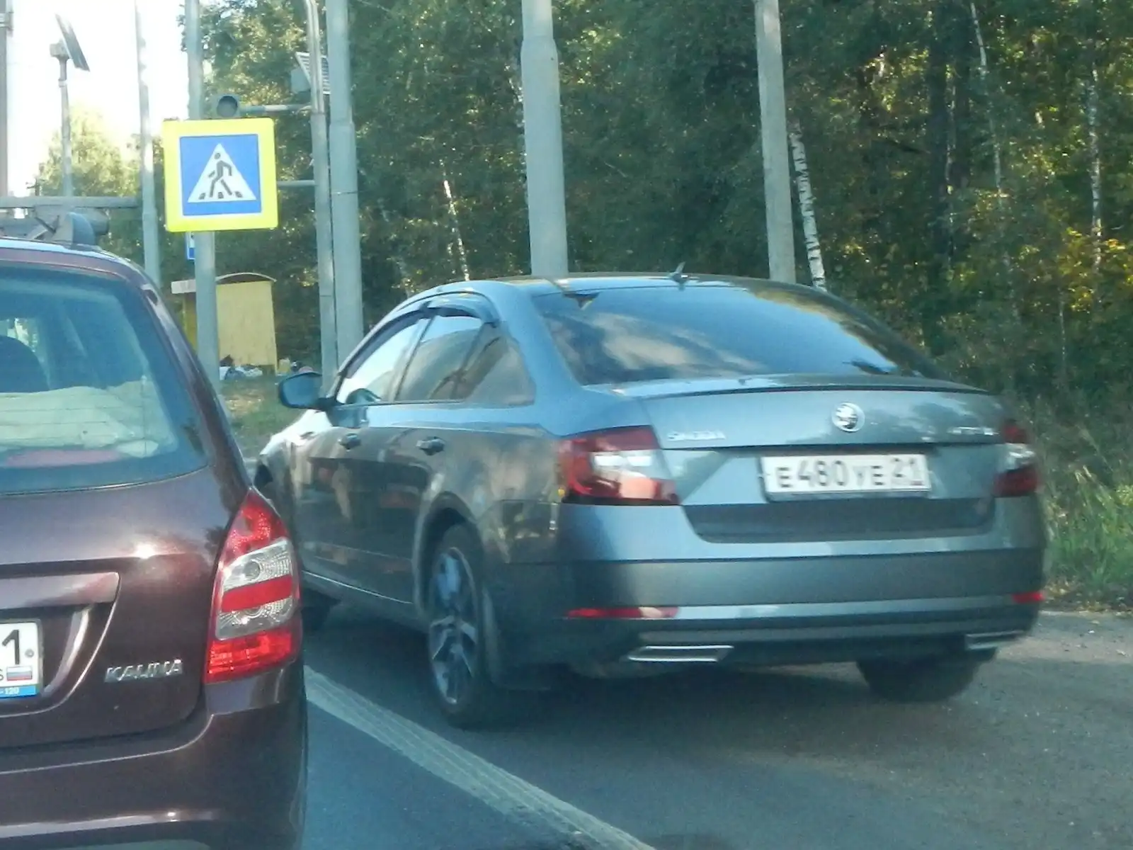 Фото автомобиля SKODA OCTAVIA, 2017 — госномер Т142НЕ152. Цвет: темно-серый
