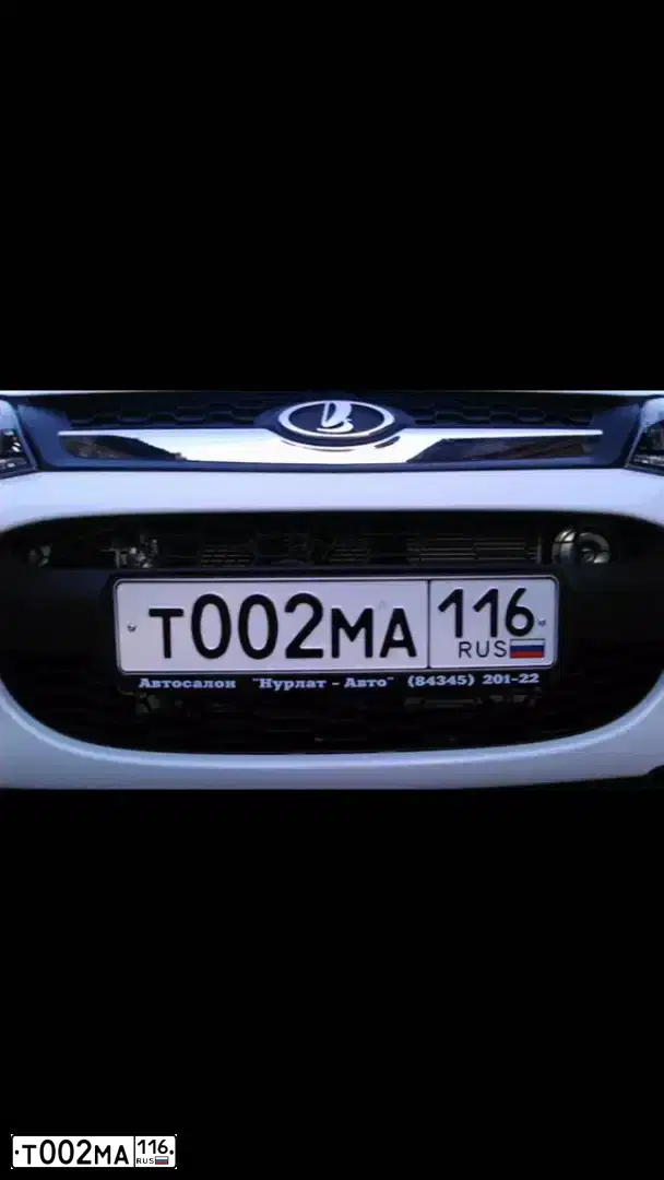 Фото автомобиля LADA 2194 KALINA, 2014 — госномер Т002МА116. Цвет: БЕЛЫЙ