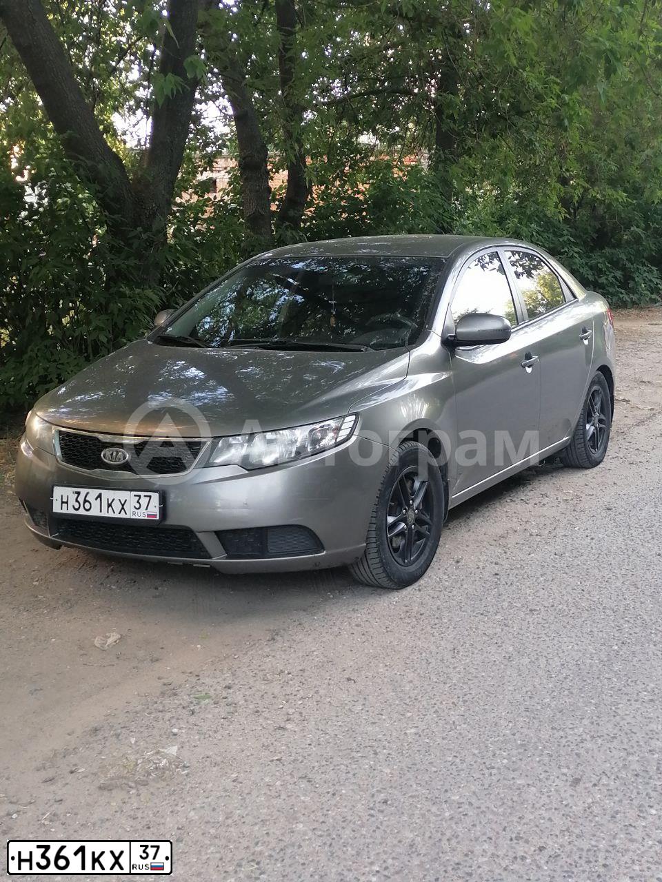 Фото автомобиля KIA CERATO, 2011 — госномер Т232УН33. Цвет: СЕРЫЙ