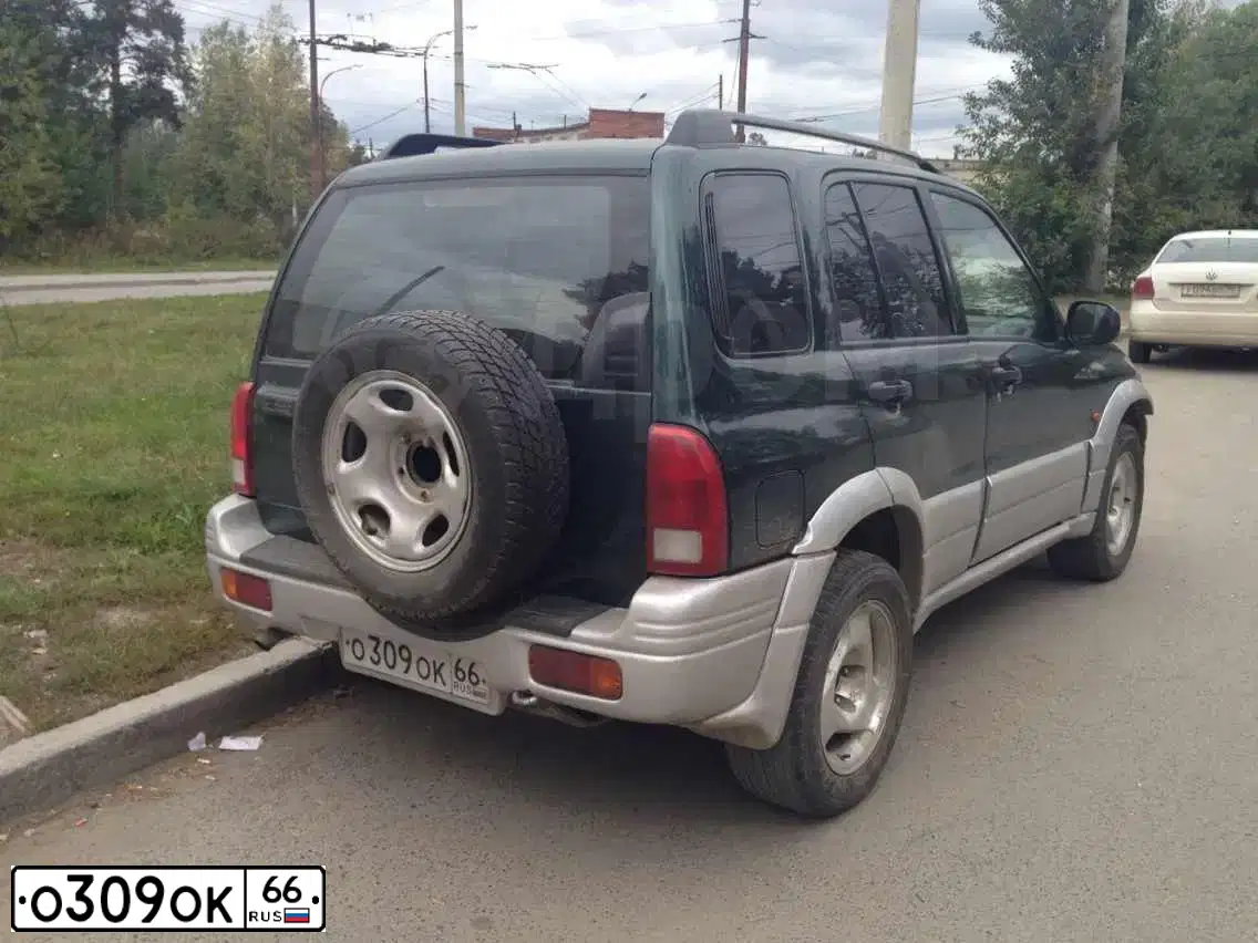Фото автомобиля IZH 2126, 2005 — госномер О390ОК66. Цвет: ФИОЛЕТОВЫЙ