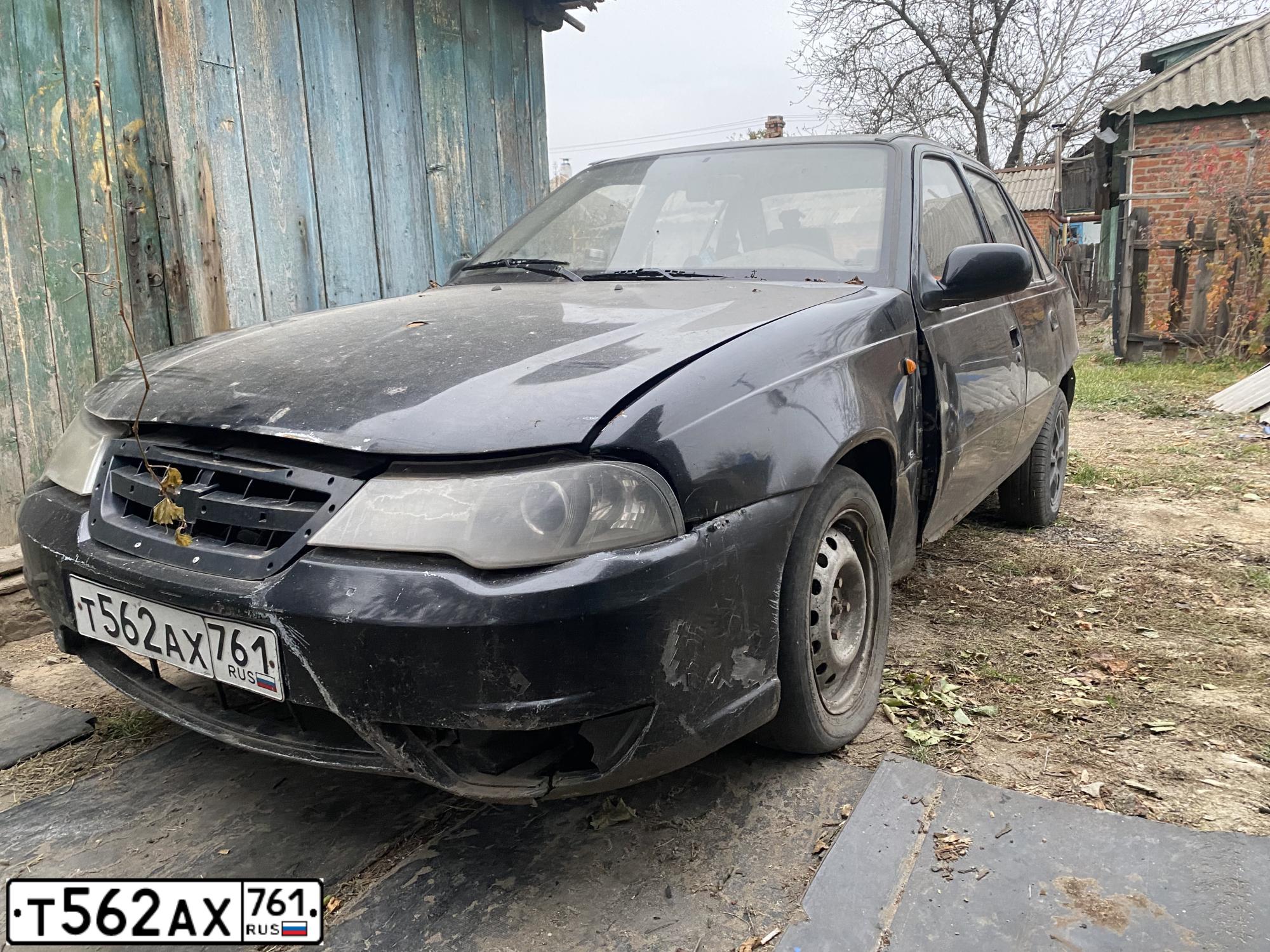 Фото автомобиля DAEWOO NEXIA, 2009 — госномер Т562АХ761. Цвет: КОРАЛЛОВО-ЧЕРНЫЙ