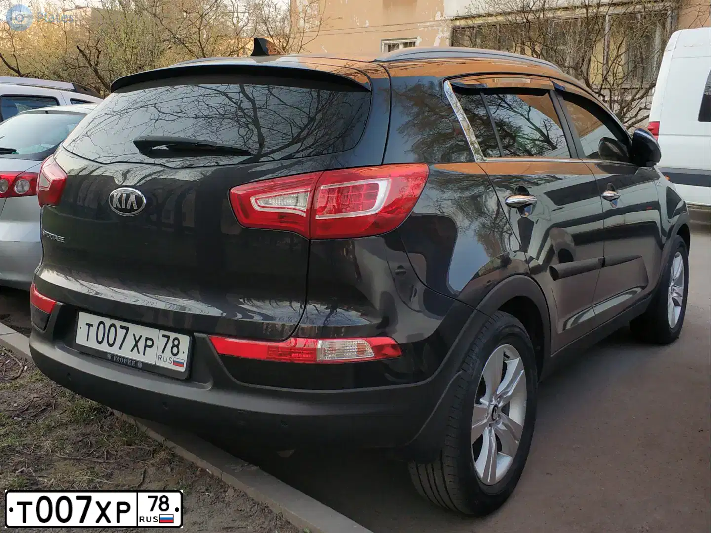 Фото автомобиля KIA SPORTAGE, 2012 — госномер Т007ХР78. Цвет: ЧЕРНЫЙ ПЕРЛАМУТР