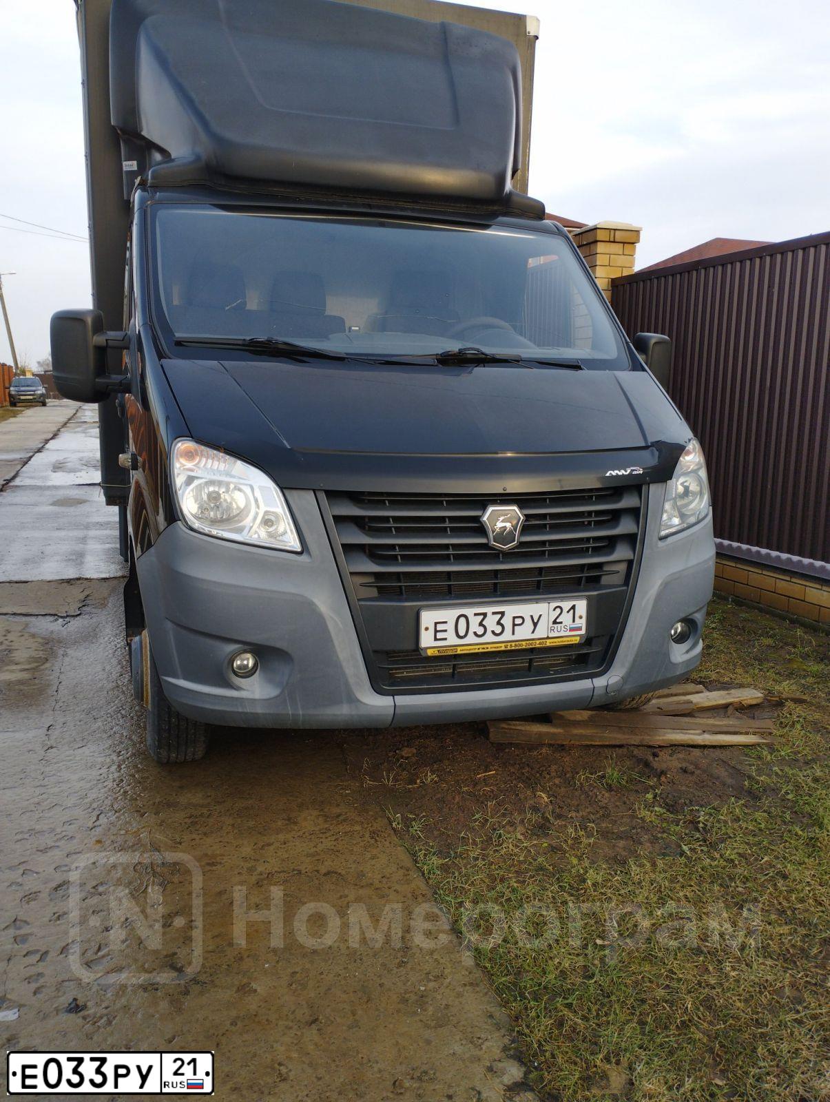 Фото автомобиля GAZ EL NEXT, 2016 — госномер Е033РУ21. Цвет: ЧЕРНЫЙ