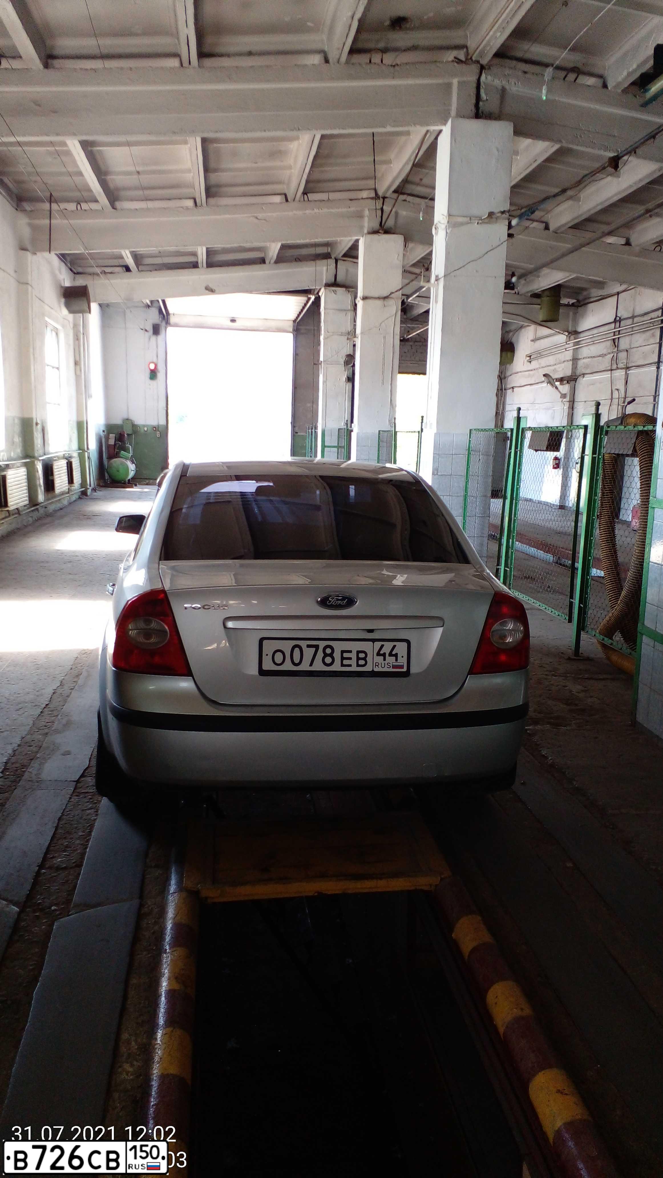 Фото автомобиля FORD FOCUS, 2006 — госномер Н287СР76. Цвет: СЕРЫЙ
