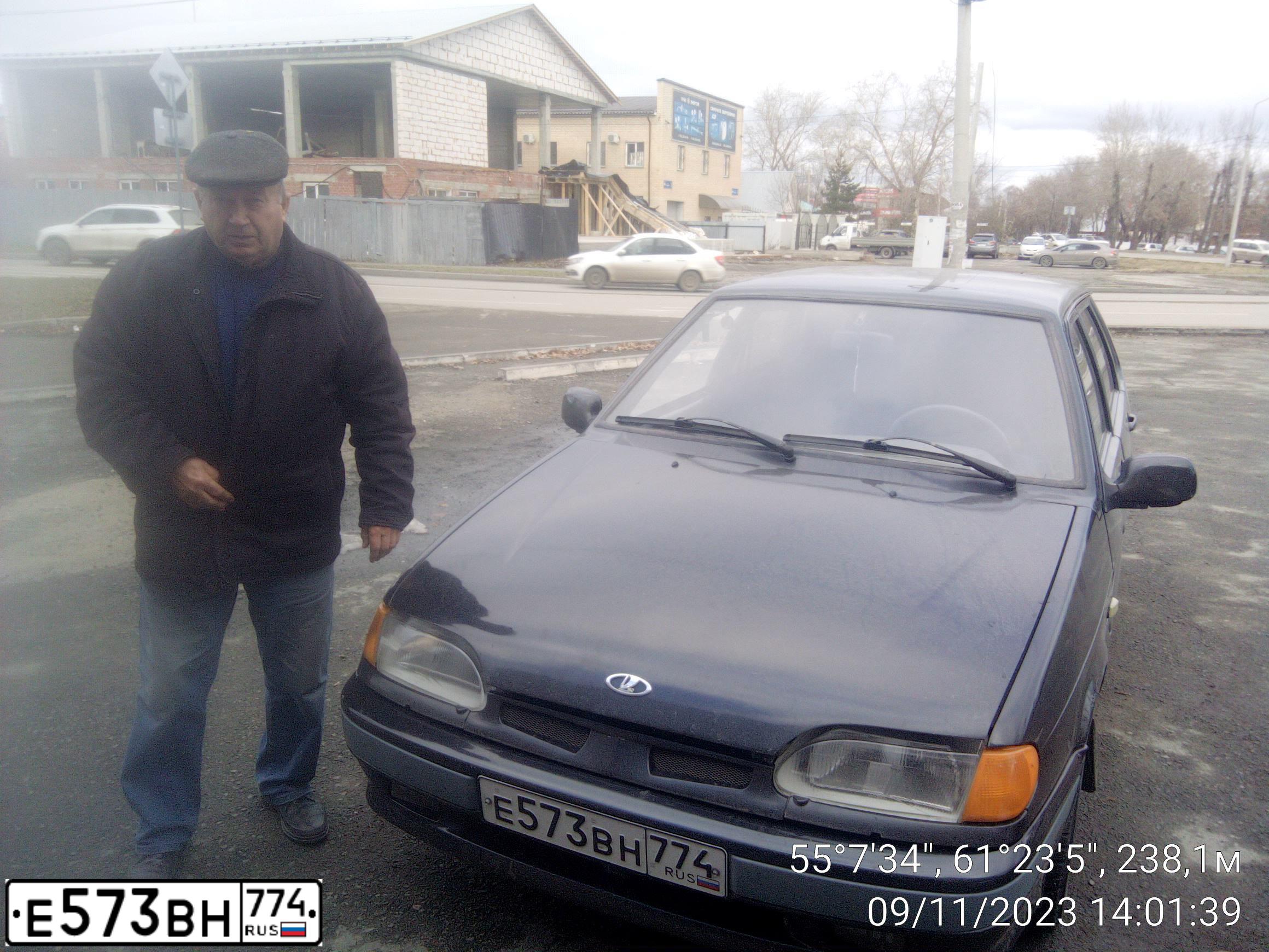 Фото автомобиля LADA 2115 SAMARA, 2005 — госномер Е573ВН774. Цвет: Черный графитовый металлик