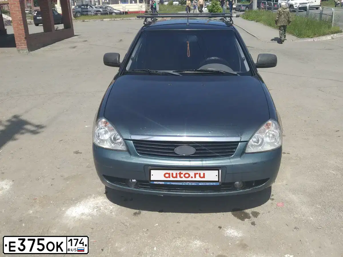 Фото автомобиля LADA 2172 PRIORA, 2011 — госномер Е375ОК174. Цвет: ТЕМНО-ВИШНЕВЫЙ