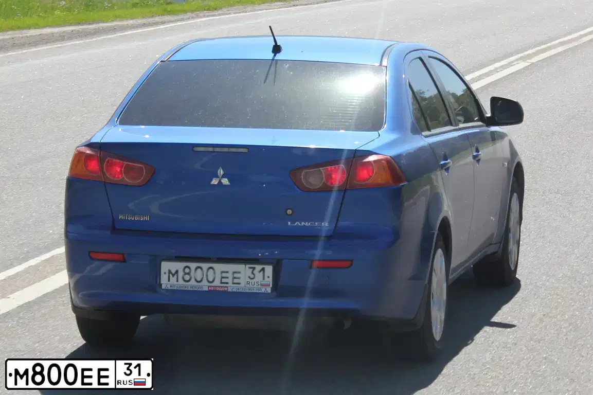 Фото автомобиля MITSUBISHI LANCER, 2008 — госномер О509АХ31. Цвет: СИНИЙ