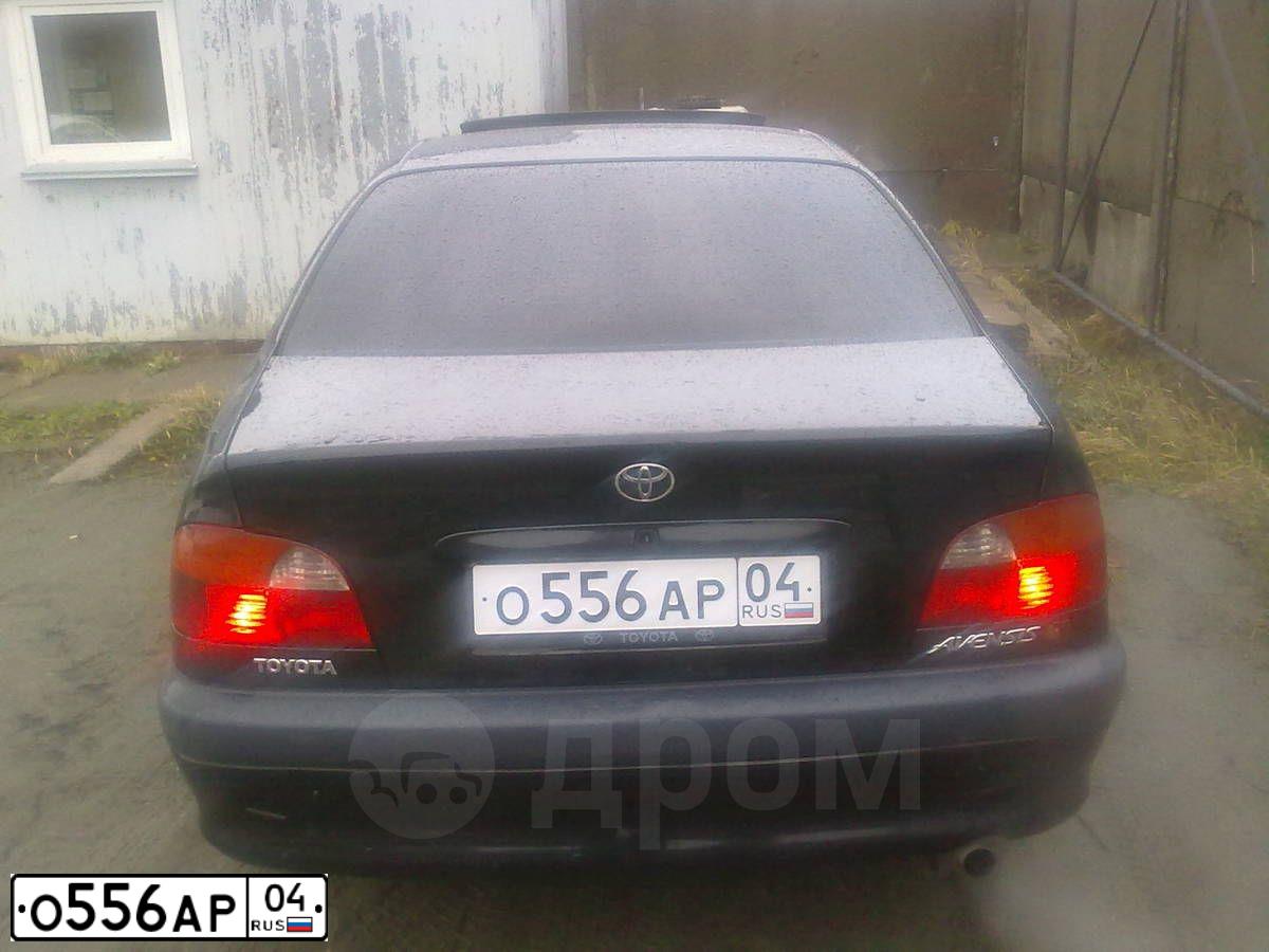Фото автомобиля TOYOTA AVENSIS, 1998 — госномер О556АР04. Цвет: ЧЕРНЫЙ МЕТАЛЛИК