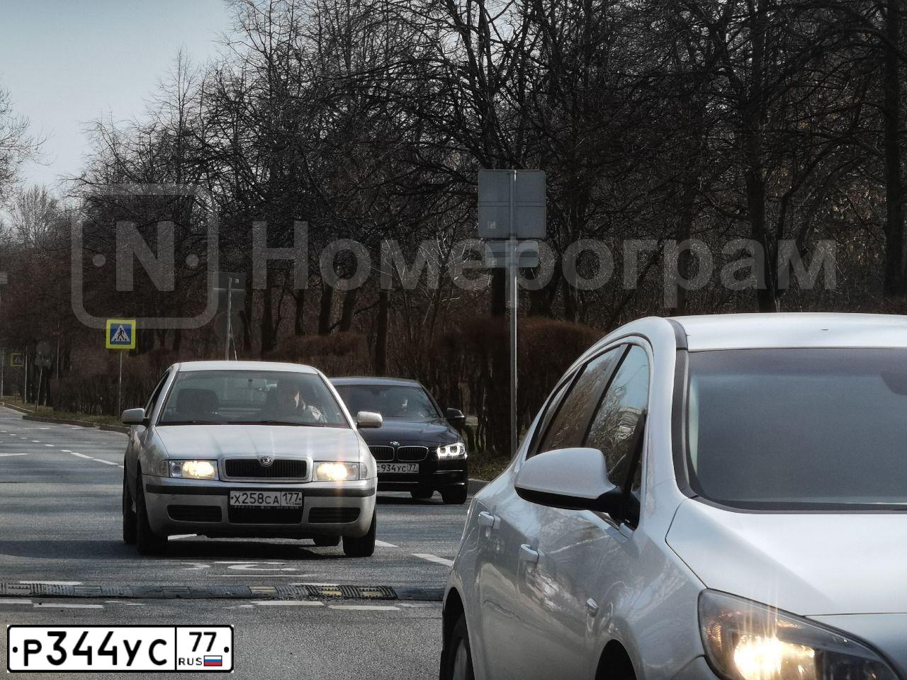 Фото автомобиля AUDI Q7, 2012 — госномер Р344УС77. Цвет: ЧЕРНЫЙ