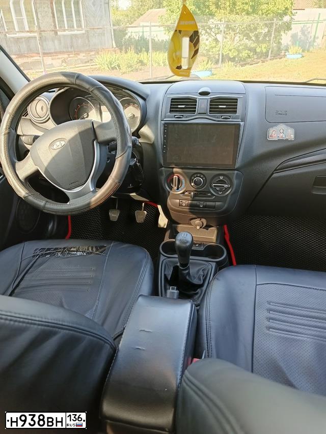 Фото автомобиля LADA 2190 GRANTA, 2019 — госномер Н938ВН136. Цвет: Золотисто-коричневый