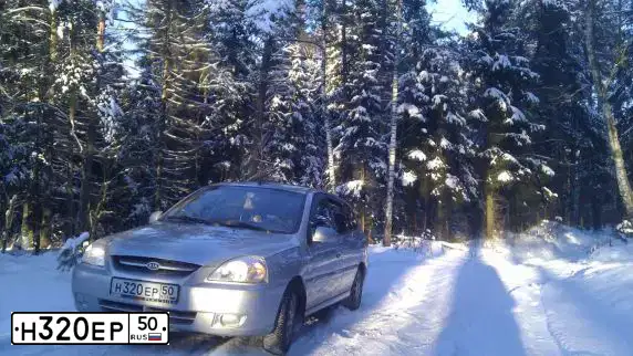 Фото автомобиля ГАЗ 310200, 1995 — госномер Н320ЕР50. Цвет: ЧЕРНЫЙ