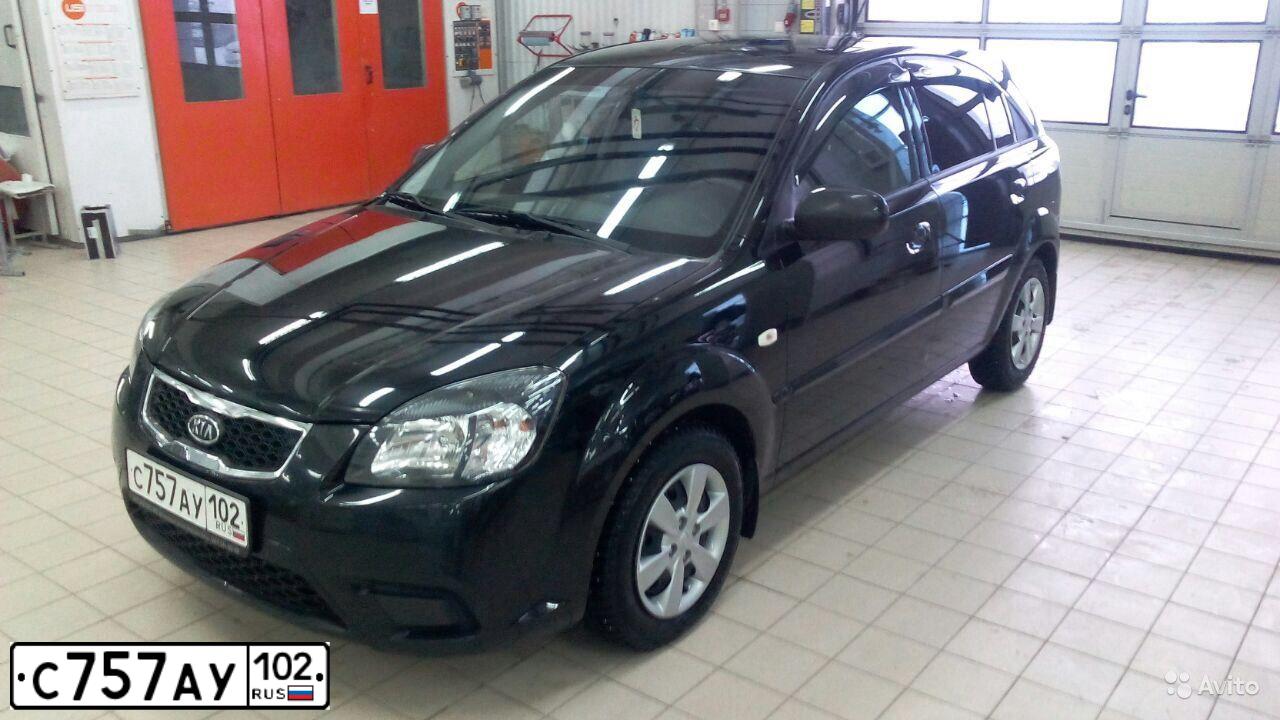 Фото автомобиля KIA RIO, 2011 — госномер М464КМ702. Цвет: ЧЕРНЫЙ