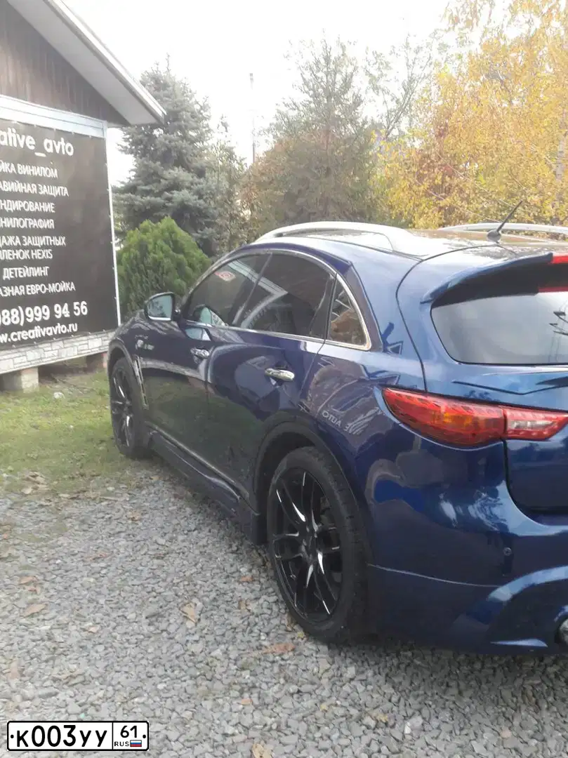 Фото автомобиля INFINITI QX70, 2014 — госномер У814ЕМ761. Цвет: синий