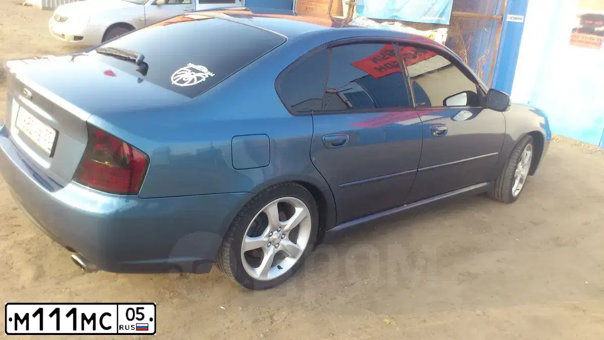 Фото автомобиля FORD FOCUS, 2011 — госномер У885ВМ05. Цвет: СЕРО-ГОЛУБОЙ