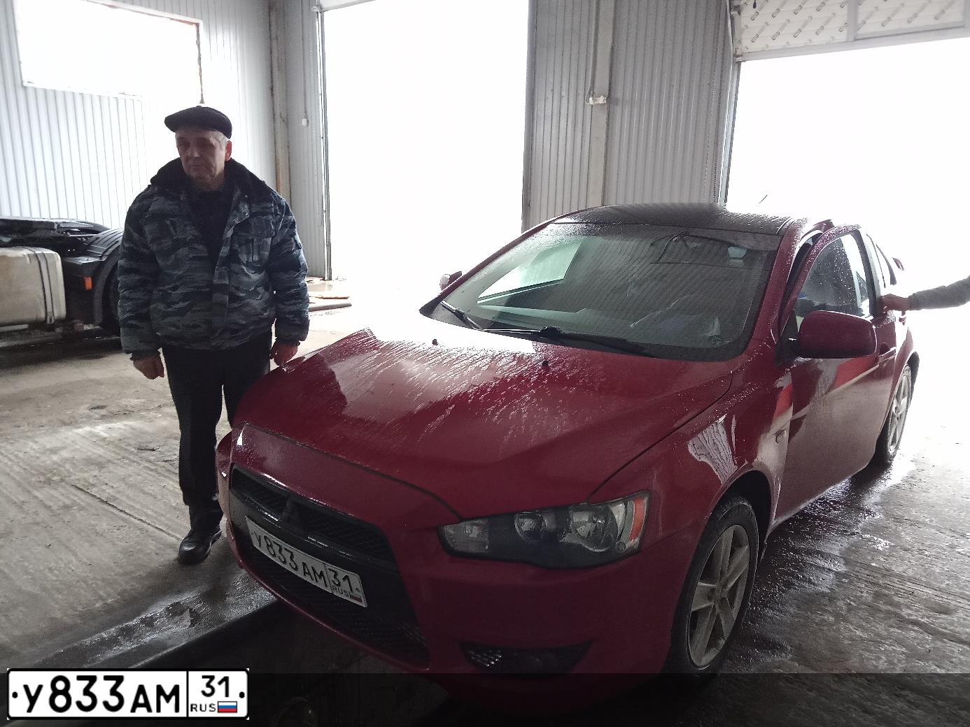 Фото автомобиля MITSUBISHI LANCER, 2007 — госномер У833АМ31. Цвет: Красный