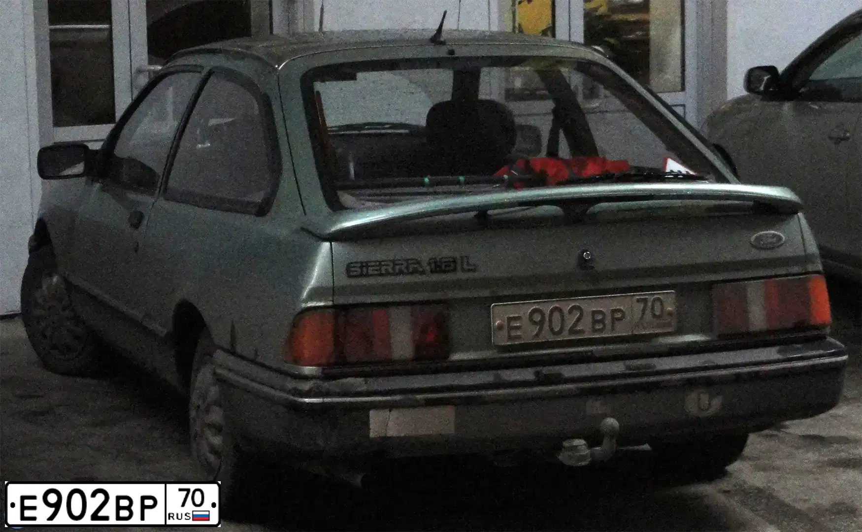 Фото автомобиля FORD SIERRA, 1988 — госномер К048КО122. Цвет: СЕРО-ЗЕЛЕНЫЙ