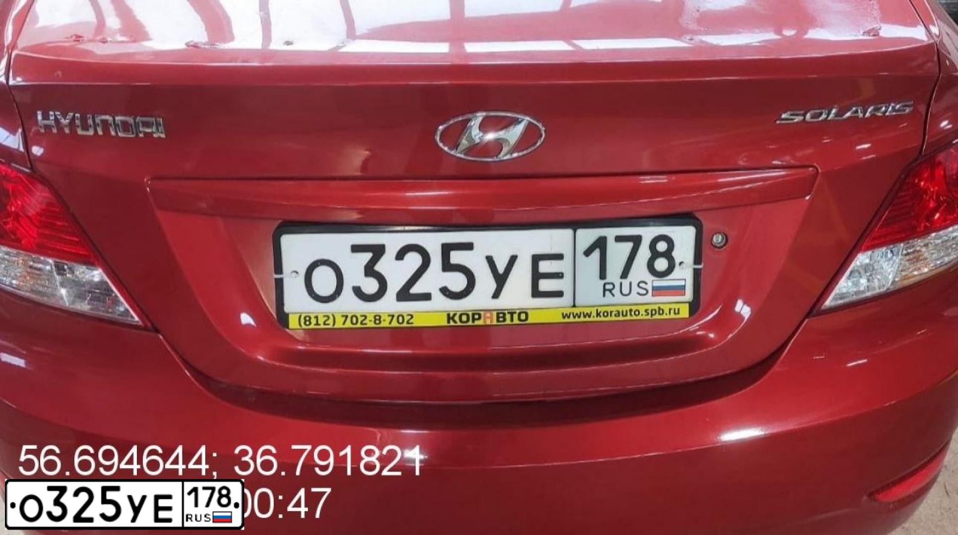 Фото автомобиля HYUNDAI SOLARIS, 2012 — госномер О325УЕ178. Цвет: КРАСНЫЙ ГРАНАТ