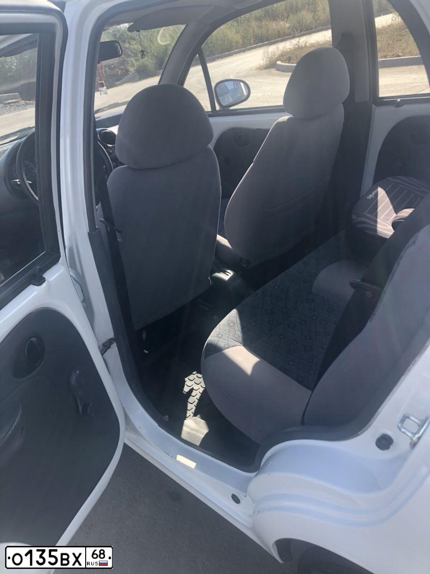 Фото автомобиля KIA RIO, 2010 — госномер О135ВХ68. Цвет: Красный