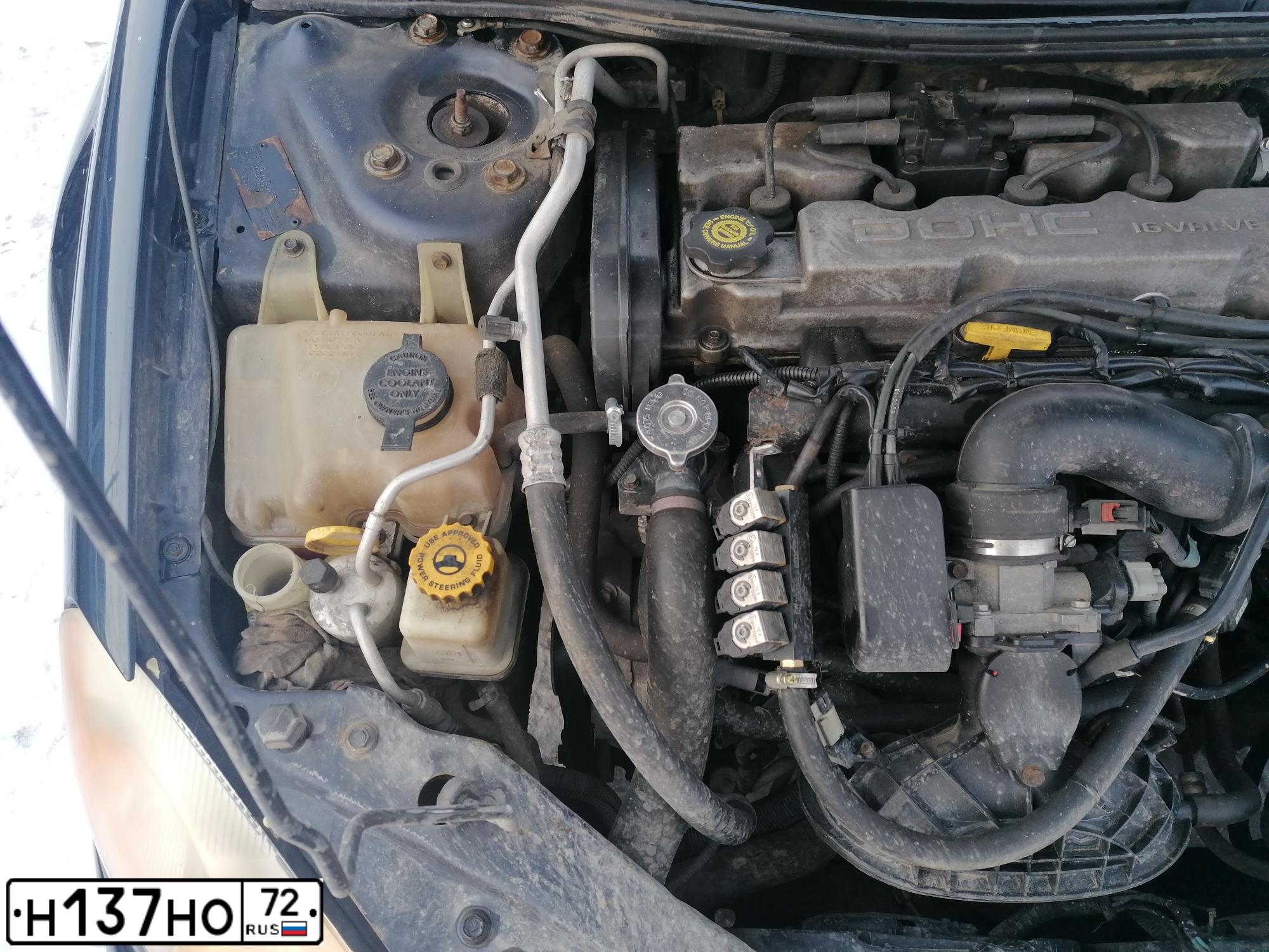 Фото автомобиля VOLVO V40, 2000 — госномер Н137НО72. Цвет: БЕЛЫЙ (СЕРЫЙ)