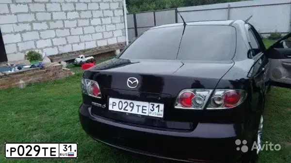 Фото автомобиля MAZDA A 6, 2005 — госномер Р029ТЕ31. Цвет: БАКЛАЖАННЫЙ