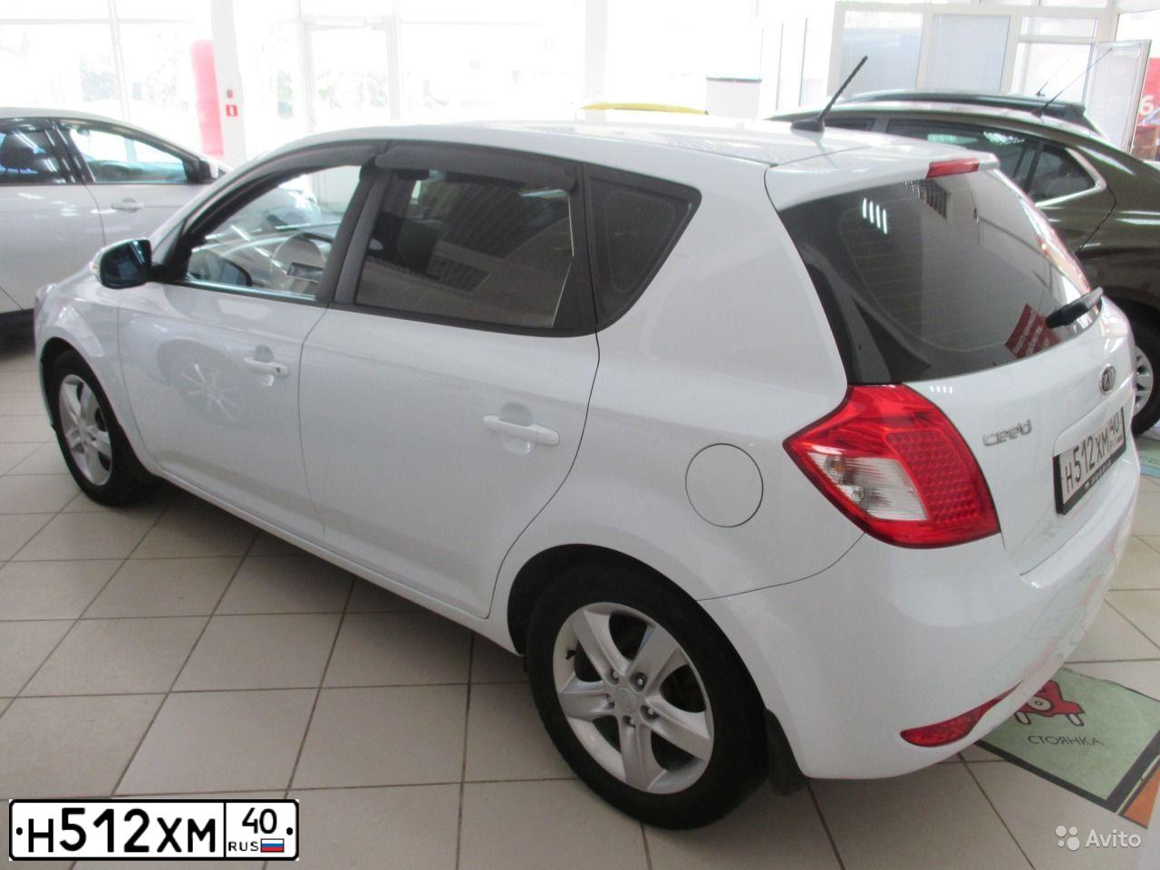 Фото автомобиля KIA CEE'D, 2011 — госномер Н464ВН40. Цвет: Белый