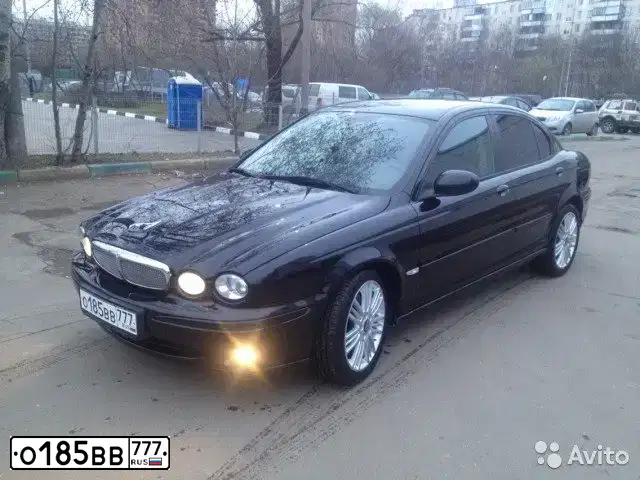 Фото автомобиля JAGUAR X-TYPE, 2007 — госномер О185ВВ777. Цвет: ЧЕРНЫЙ