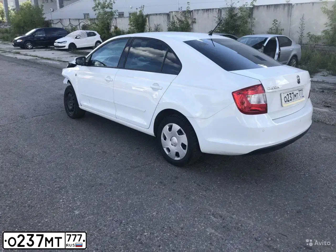 Фото автомобиля SKODA RAPID, 2014 — госномер М945ТХ21. Цвет: Белый