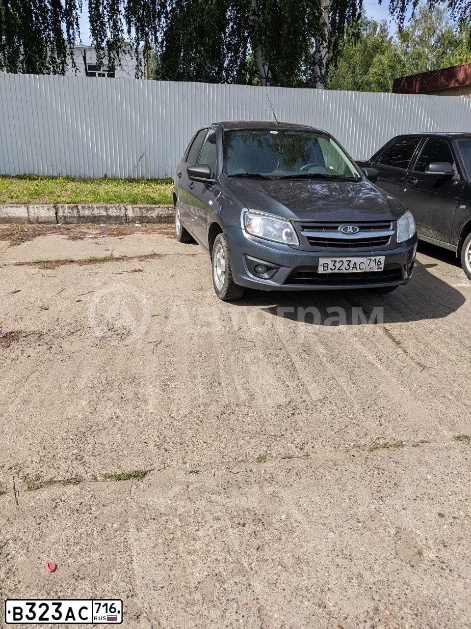 Фото автомобиля LADA 2190 GRANTA, 2018 — госномер В323АС716. Цвет: СЕРЕБРИСТО-ТЕМНО-СЕРЫЙ