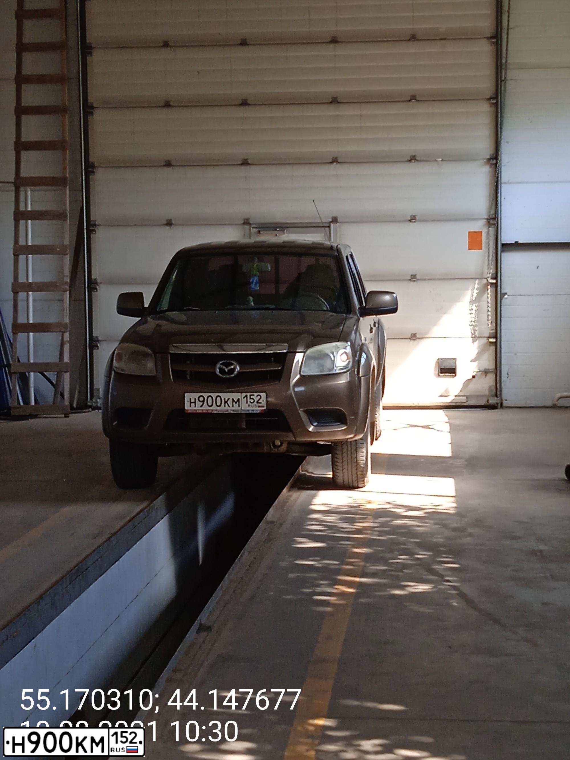 Фото автомобиля MAZDA BT-50, 2008 — госномер М915СК134. Цвет: Коричневый