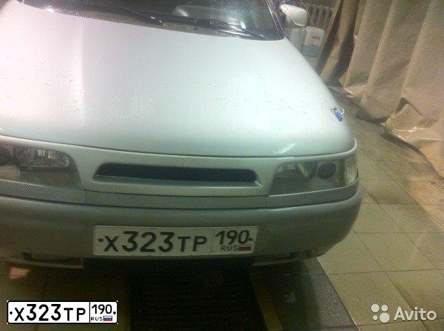 Фото автомобиля LADA 2112 LADA, 2005 — госномер Х323ТР190. Цвет: Белый