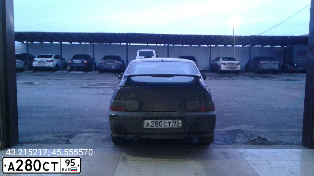 Фото автомобиля LADA 2112, 2007 — госномер В182КЕ06. Цвет: Сине-Черный