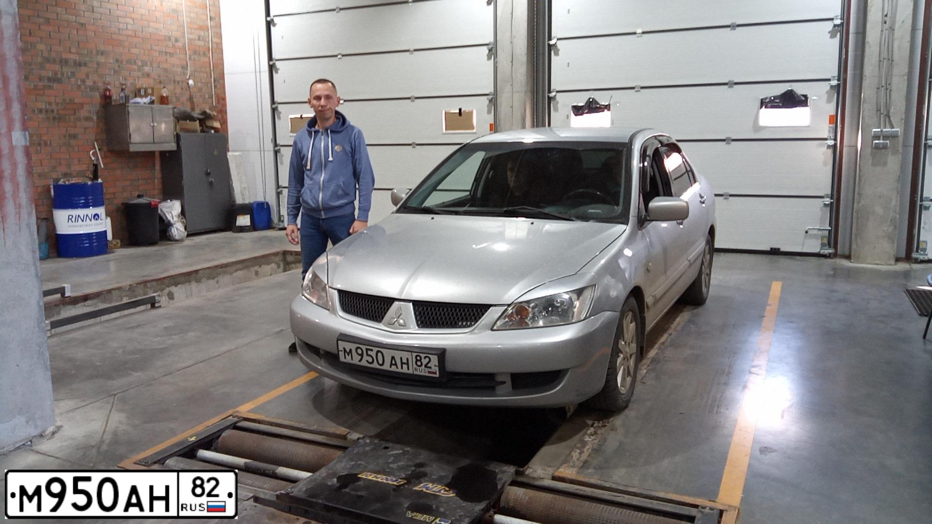 Фото автомобиля MITSUBISHI LANCER, 2007 — госномер Т404ТК177. Цвет: Серебристый